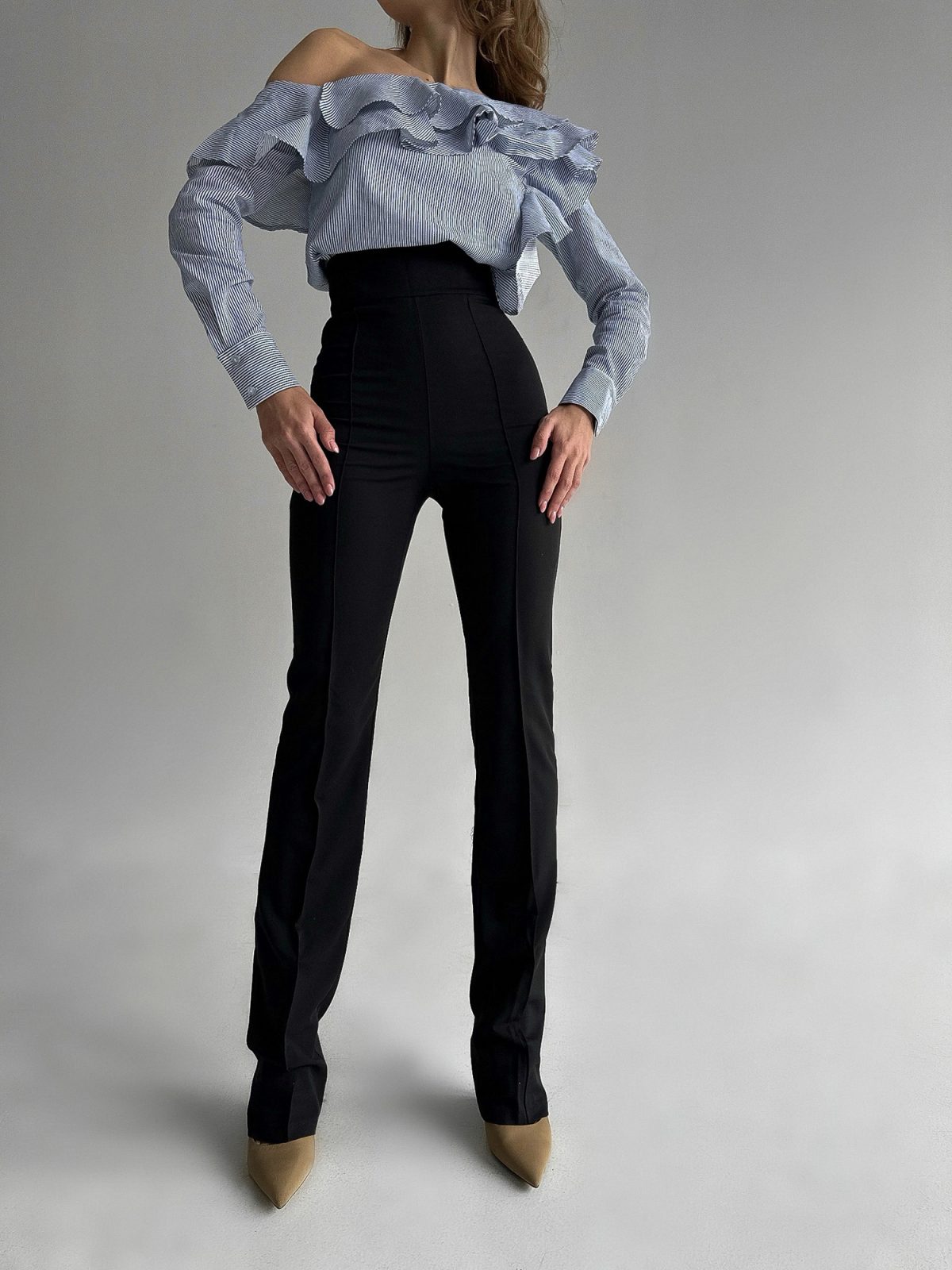 Side view of one-shoulder long sleeve top in blue and white stripe — sizes XXS to M