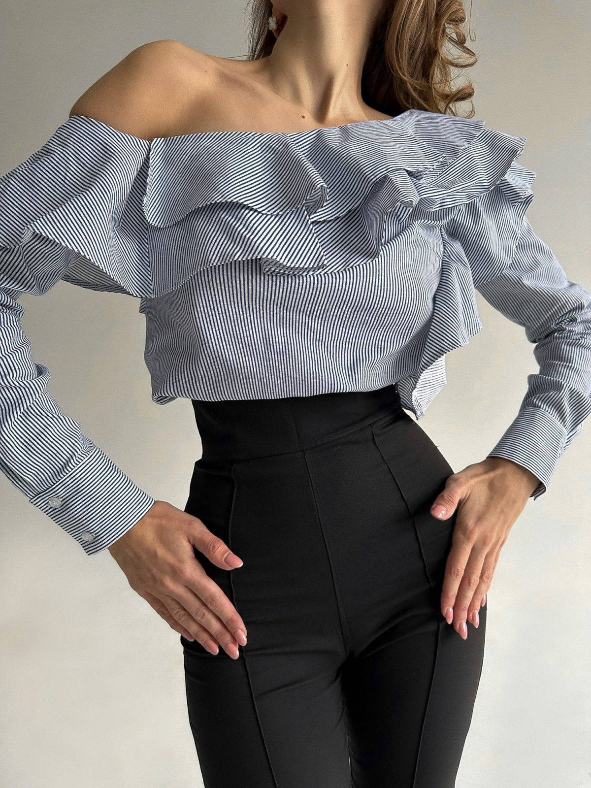 ruffle Front view of asymmetric ruffle blouse with vertical front detail — GLOWSYOU