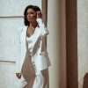 Women's ivory blazer with sharp peaked lapels and double-breasted buttons
