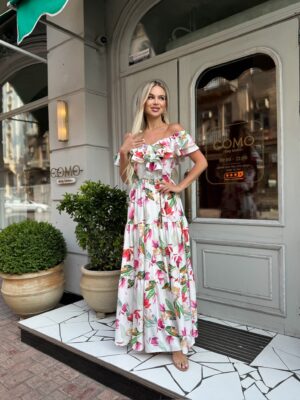 Romantic off-shoulder floral maxi dress with double ruffle neckline, elastic neckline and cinched elastic waist displayed on a white background