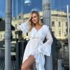 Premium viscose fabric texture white dress - soft breathable natural material closeup